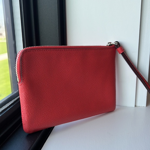 L zip wristlet in Coach’s signature Sun orange color - Picture 6 of 6